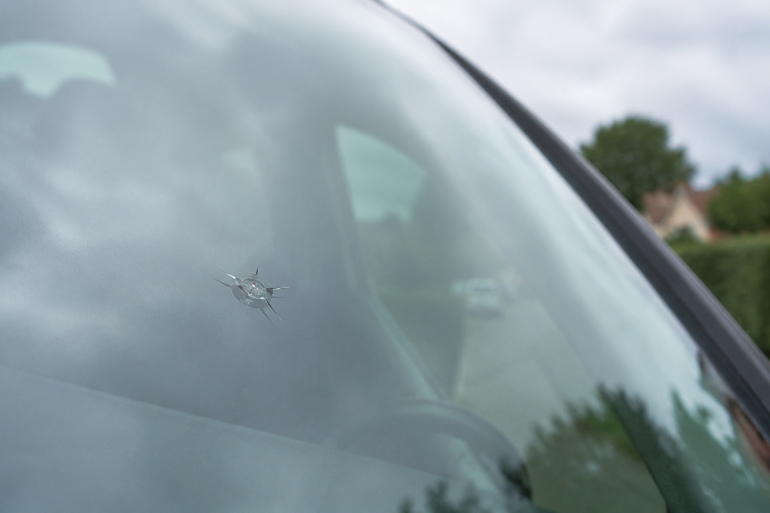 Repairable stone chip on a car windscreen